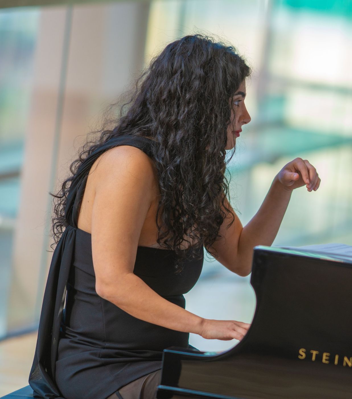 Homa Samiei playing a Steinway grand piano